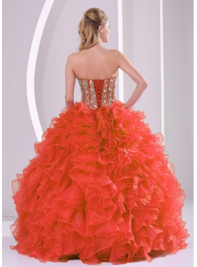 Ball Gown Sweetheart Ruffles and Beaded Decorate Coral Red Quinceanera Gowns