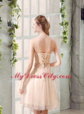 Champagne A Line Strapless Appliques Bridesmaid Dress