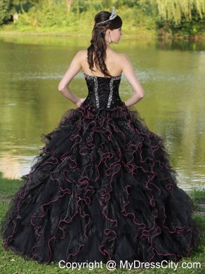 Black Quinceanera Dress with Beadings and Red Hemline Ruffles