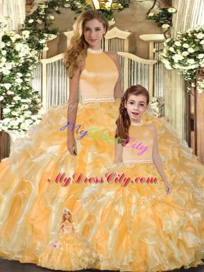 Gold Ball Gowns Halter Top Sleeveless Organza Floor Length Backless Beading and Ruffles Quinceanera Dress