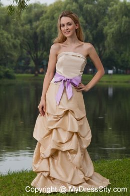 Long Pick-ups Champagne Bridesmaid Dress with Lavender Bow