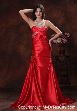 A-line Red Sweetheart Ruching Celebrity Dress With Brush Train Beading