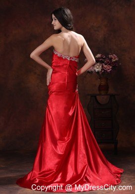 A-line Red Sweetheart Ruching Celebrity Dress With Brush Train Beading