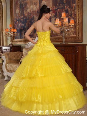 Appliques and Ruffled Layers Strapless Yellow Quinceanera Dress