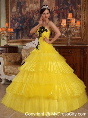 Appliques and Ruffled Layers Strapless Yellow Quinceanera Dress