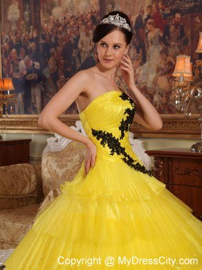 Appliques and Ruffled Layers Strapless Yellow Quinceanera Dress