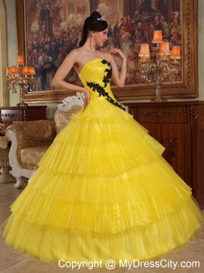 Appliques and Ruffled Layers Strapless Yellow Quinceanera Dress