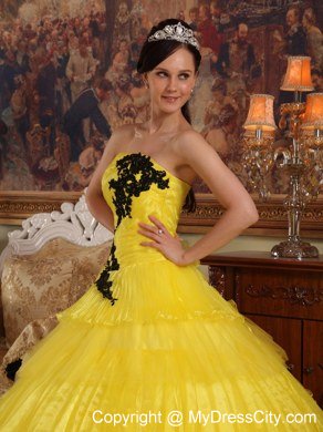 Appliques and Ruffled Layers Strapless Yellow Quinceanera Dress