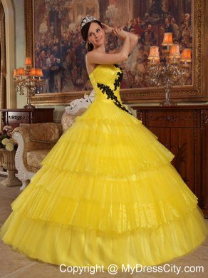 Appliques and Ruffled Layers Strapless Yellow Quinceanera Dress