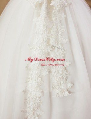 Sleeveless Tulle Floor Length Criss Cross Flower Girl Dress in White with Lace and Appliques