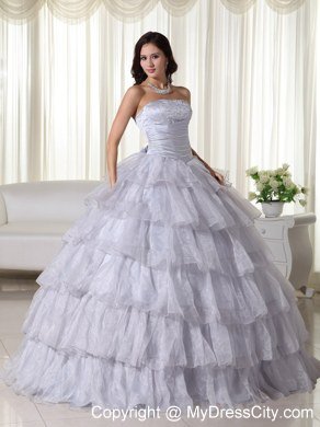 Strapless Organza Ruched Grey Quninceanera Gowns With Ruffled Layers