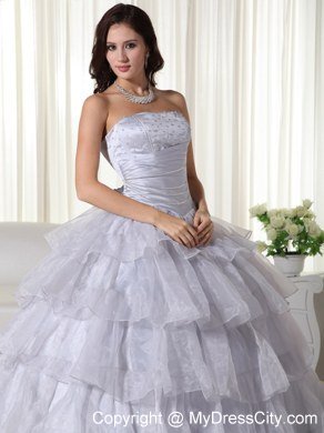 Strapless Organza Ruched Grey Quninceanera Gowns With Ruffled Layers