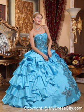 Aqua Blue Strapless Quinceanera Dress with Ruffled Layers