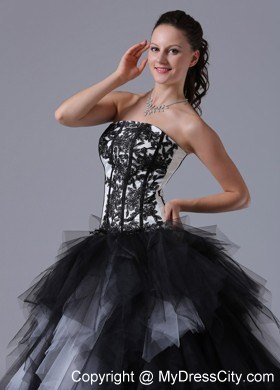 Black and White Tiered Quinceanera Dress With Embroidery