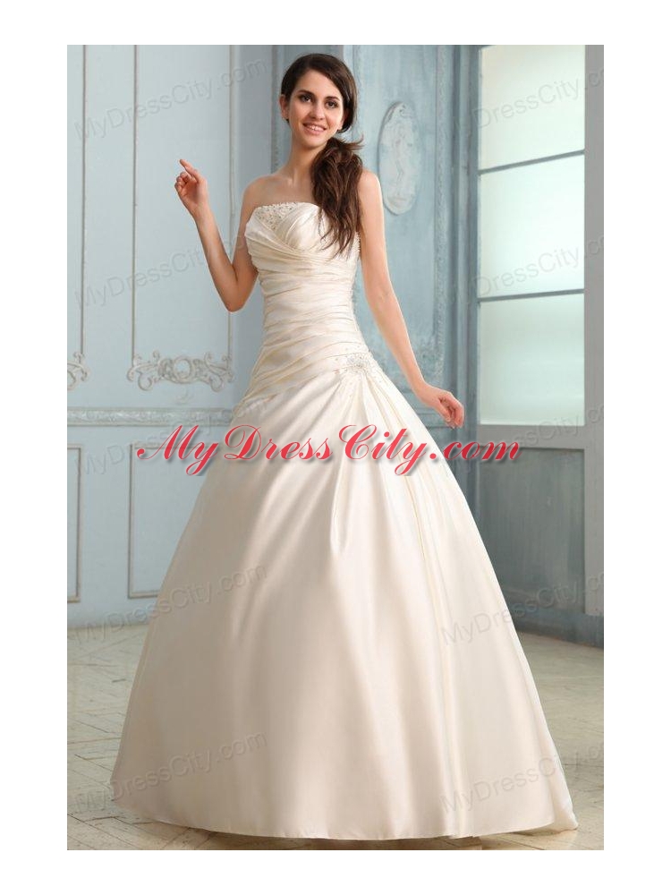 A-Line Strapless Floor-length Beading Lace Up Wedding Dress in Champagne