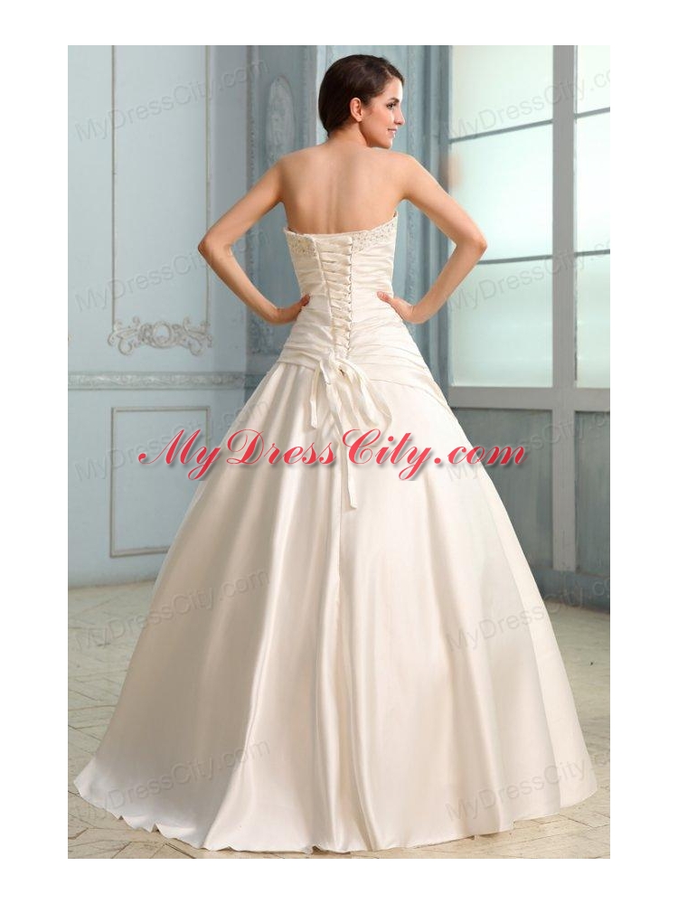 A-Line Strapless Floor-length Beading Lace Up Wedding Dress in Champagne