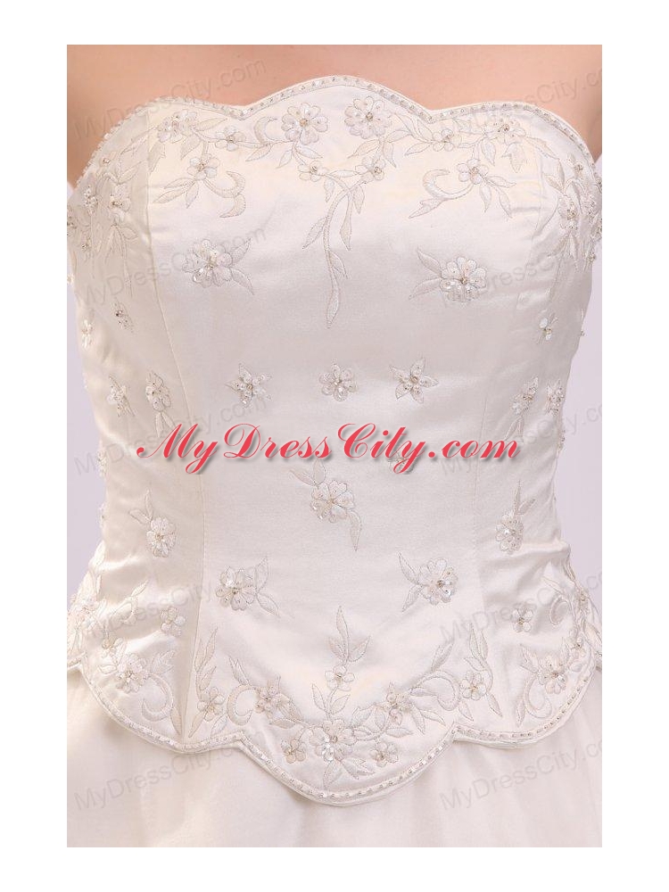 Luxurious Strapless A-line Embroidery Chapel Train Wedding Dress