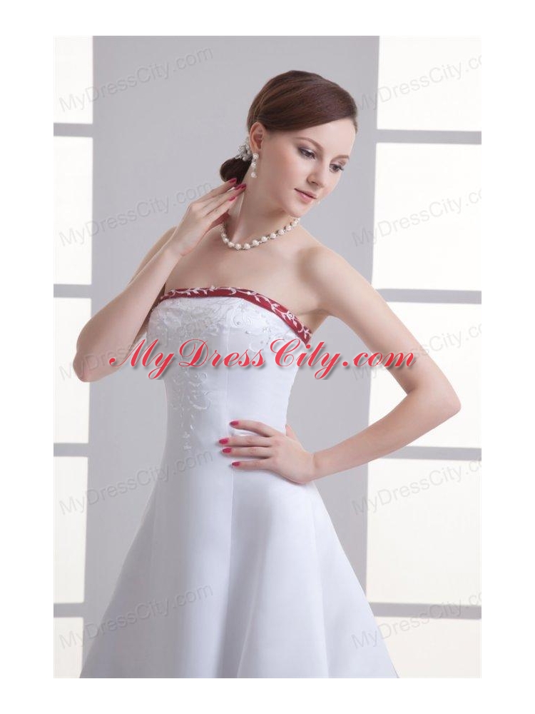 A-line Strapless Embroidery Chapel Train Satin Wedding Dress