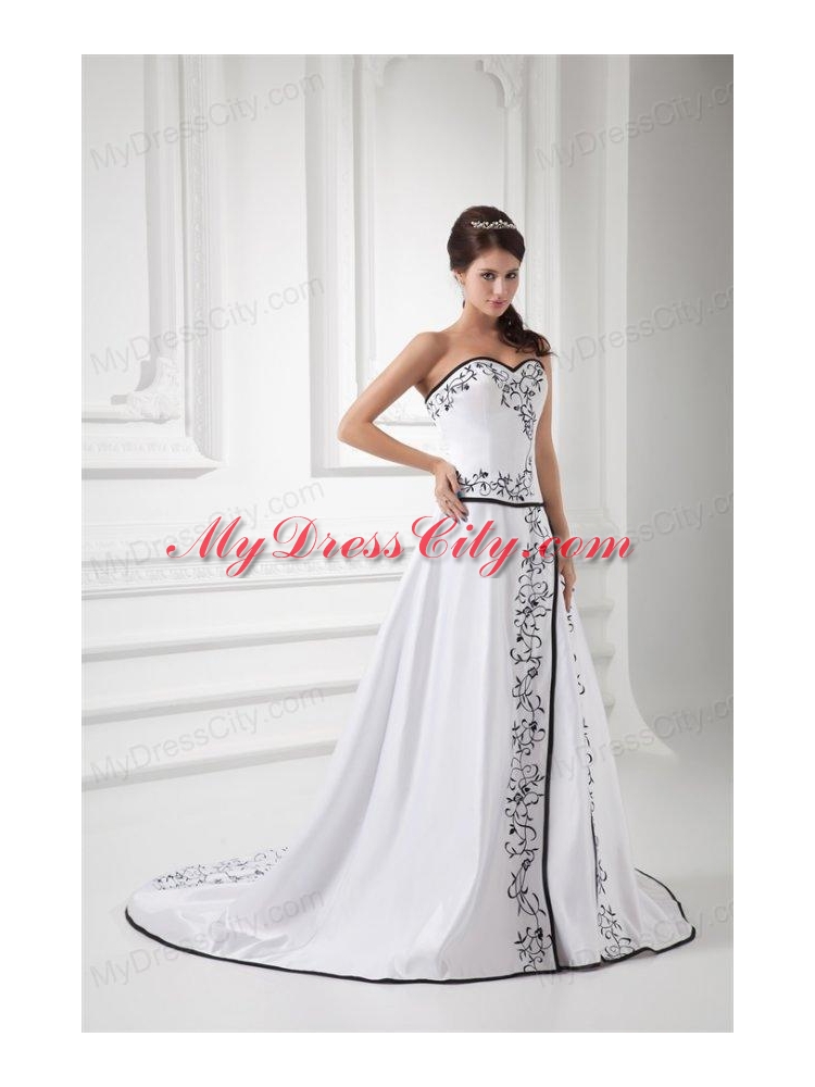 Elegant A-line Sweetheart Chapel Train Wedding Dress with Embroidery