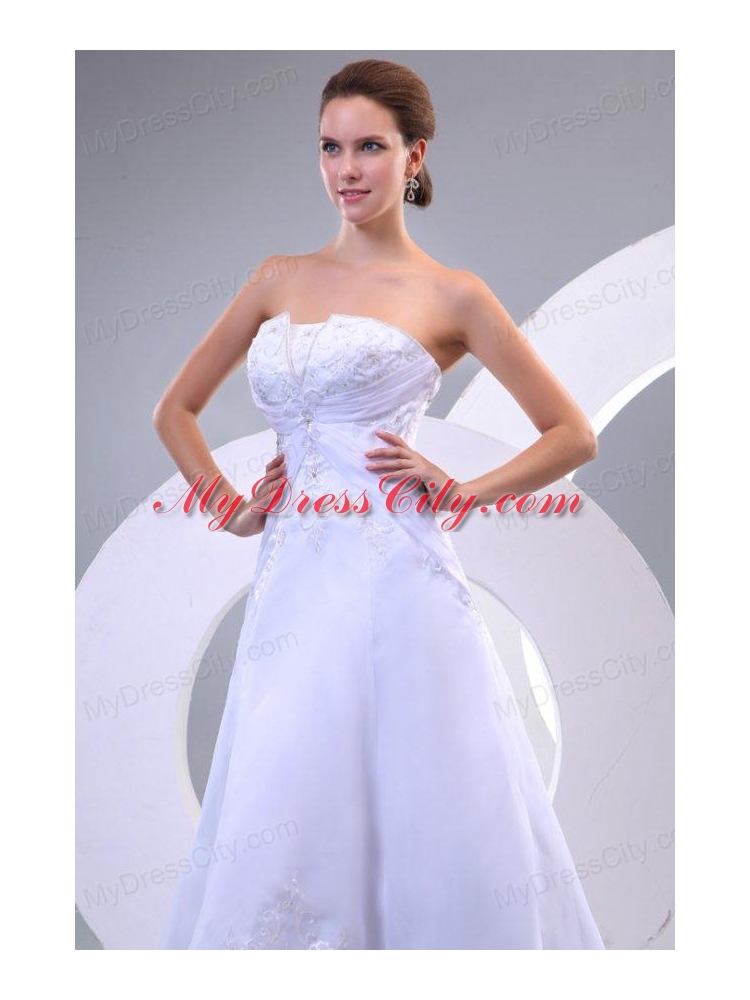 Strapless A-line Sweep Train Wedding Dress with Appliques and Beading