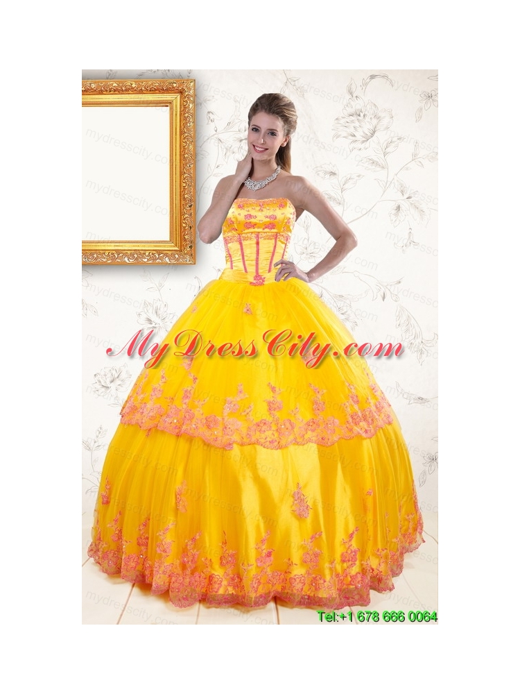 2015 Exquisite Strapless Gold Quinceanera Dresses with Appliques