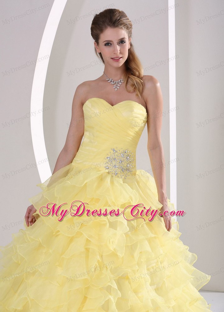 Light Yellow Sweetheart Beaded Quinceaners Gown with Ruches