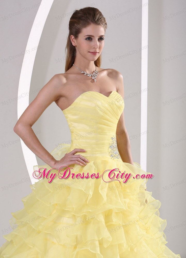 Light Yellow Sweetheart Beaded Quinceaners Gown with Ruches