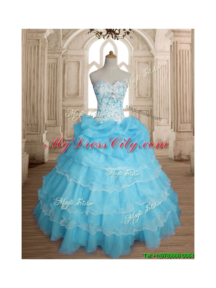 Classical Really Puffy Baby Blue Quinceanera Dress with Ruffled Layers and Beading