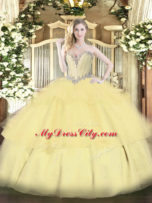 Elegant Sleeveless Tulle Floor Length Lace Up Quinceanera Gowns in Gold with Beading and Ruffled Layers