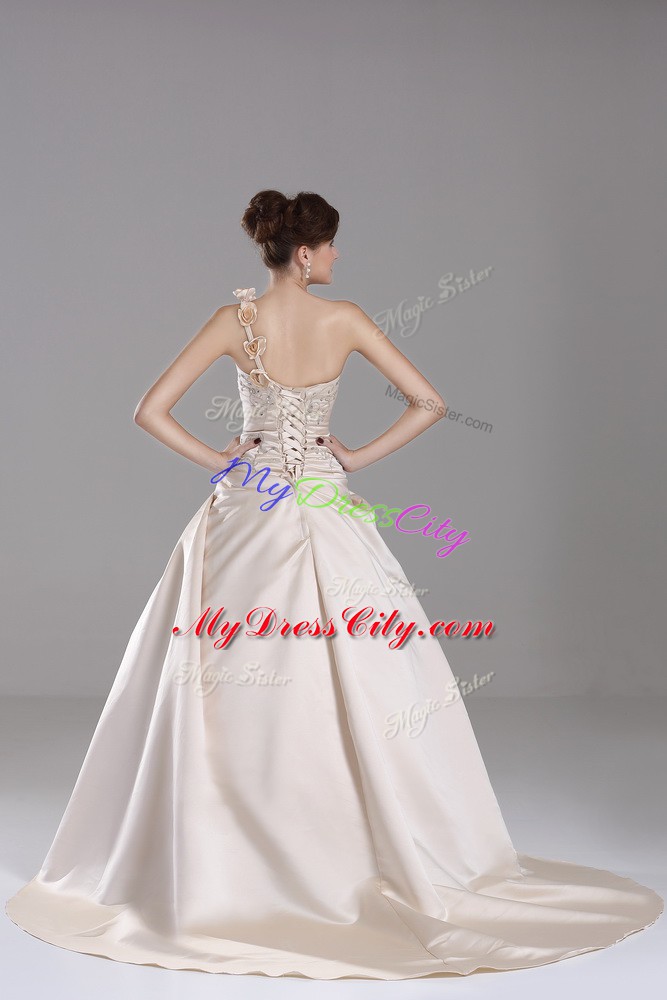 Customized Champagne Satin Lace Up One Shoulder Sleeveless Vestidos de Quinceanera Brush Train Embroidery and Hand Made Flower