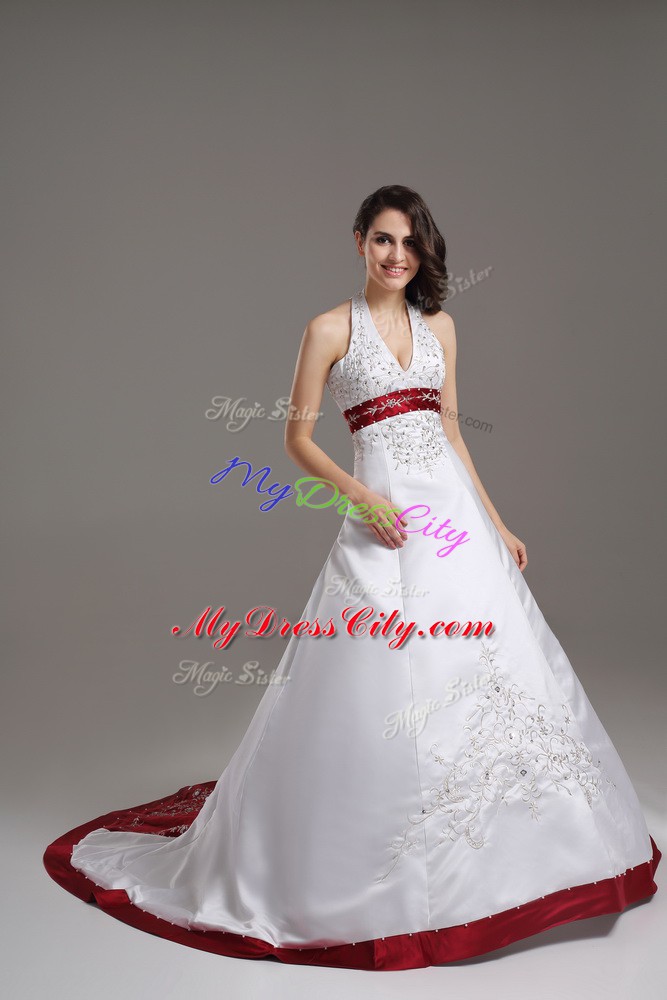 Glorious White Halter Top Neckline Beading and Embroidery Wedding Dress Sleeveless Lace Up