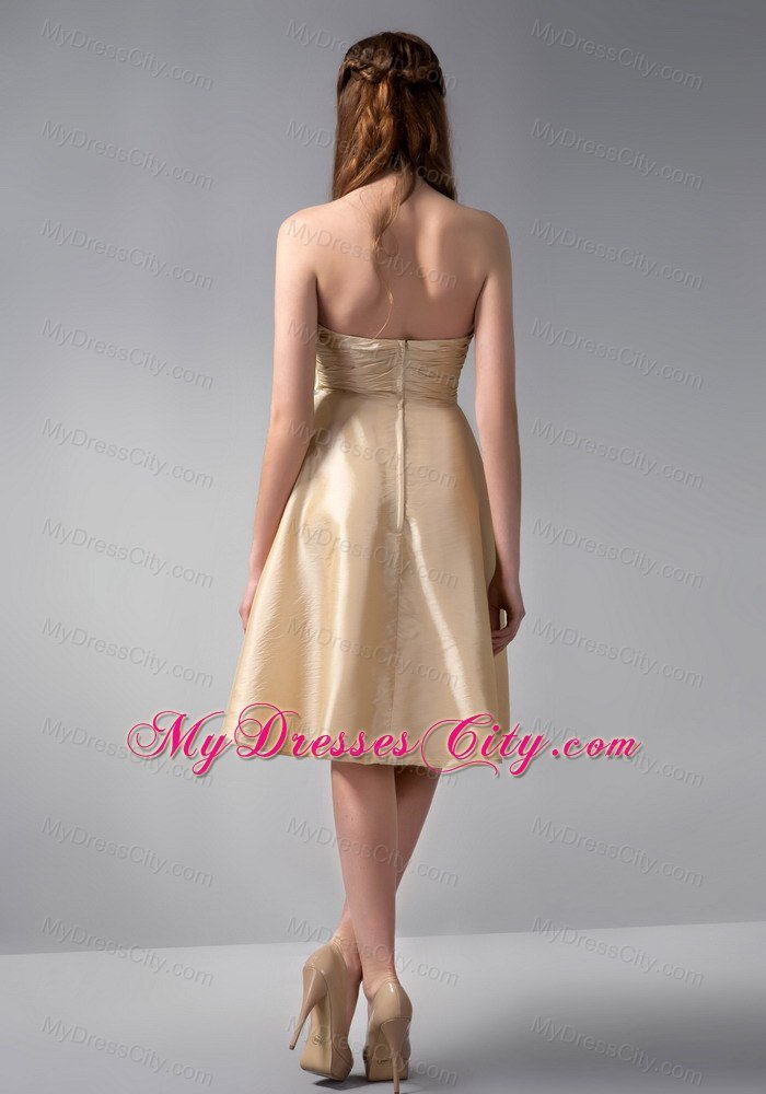 Gold Strapless Knee-length Satin Ruche Bridesmaid Dress With Floral Hem