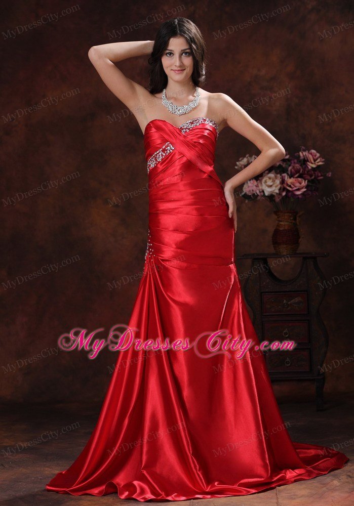 A-line Red Sweetheart Ruching Celebrity Dress With Brush Train Beading