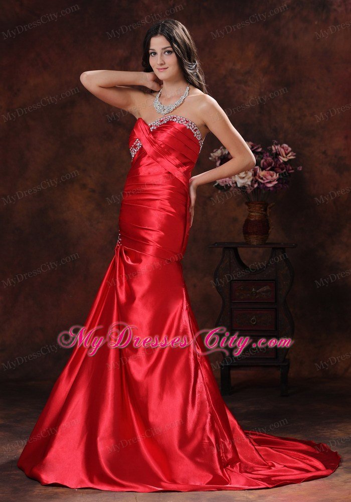 A-line Red Sweetheart Ruching Celebrity Dress With Brush Train Beading