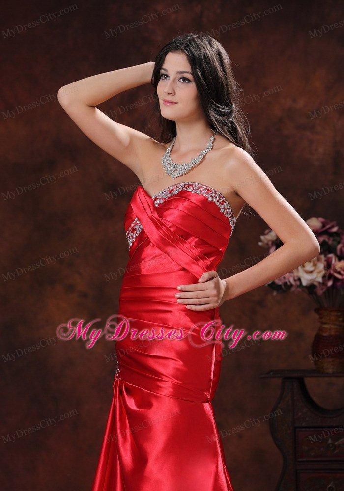 A-line Red Sweetheart Ruching Celebrity Dress With Brush Train Beading