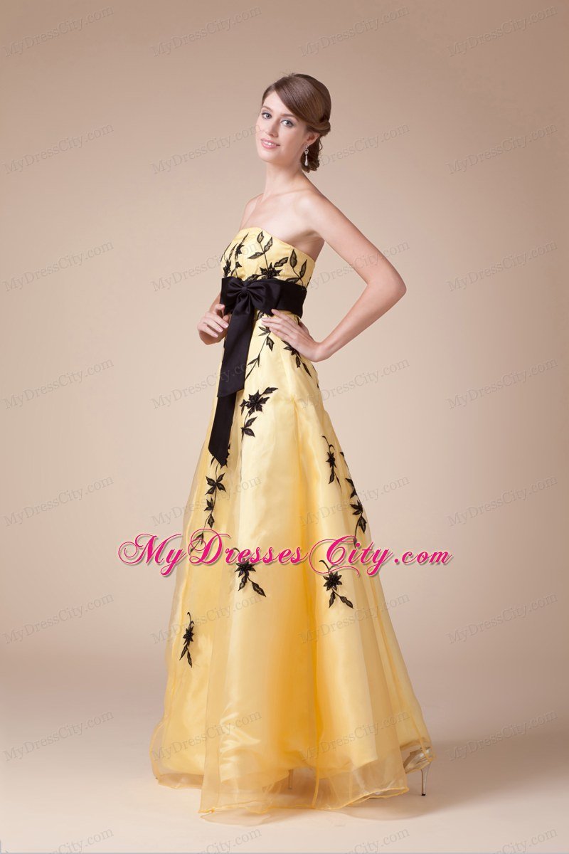 Exclusive Strapless Embroidery Yellow Prom Gown with Black Bowknot