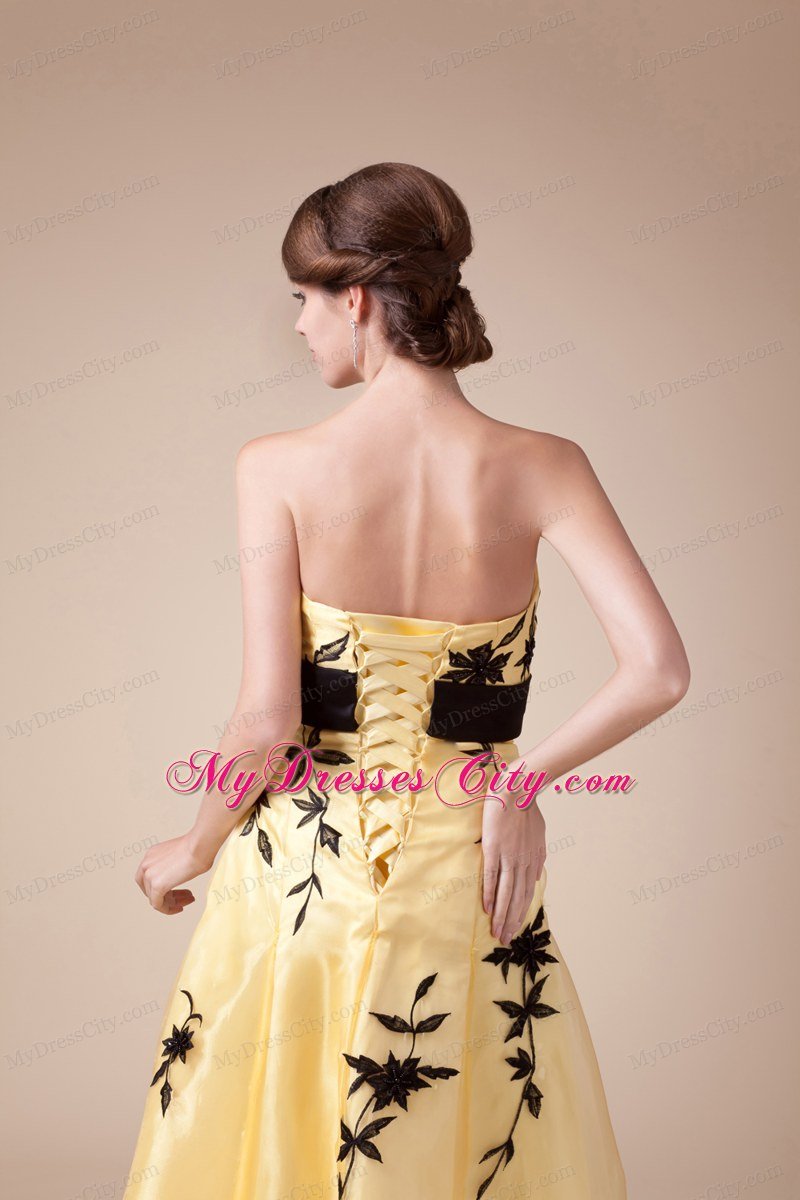 Exclusive Strapless Embroidery Yellow Prom Gown with Black Bowknot