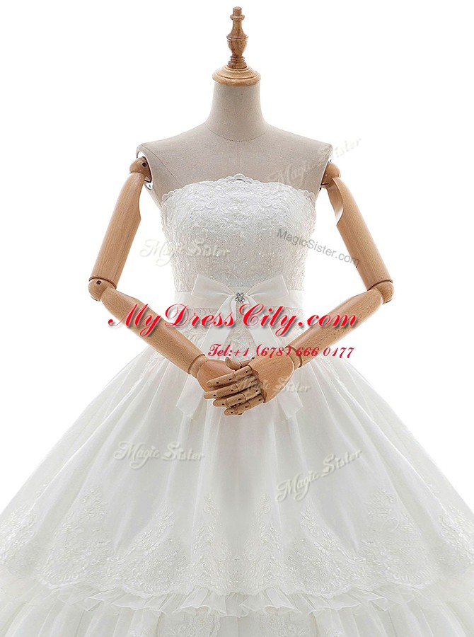 Strapless Sleeveless Wedding Gown Floor Length Lace and Appliques and Ruffled Layers and Bowknot White Organza and Tulle