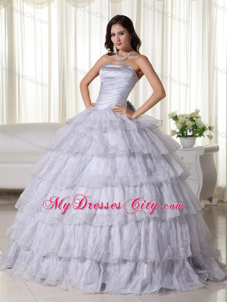 Strapless Organza Ruched Grey Quninceanera Gowns With Ruffled Layers