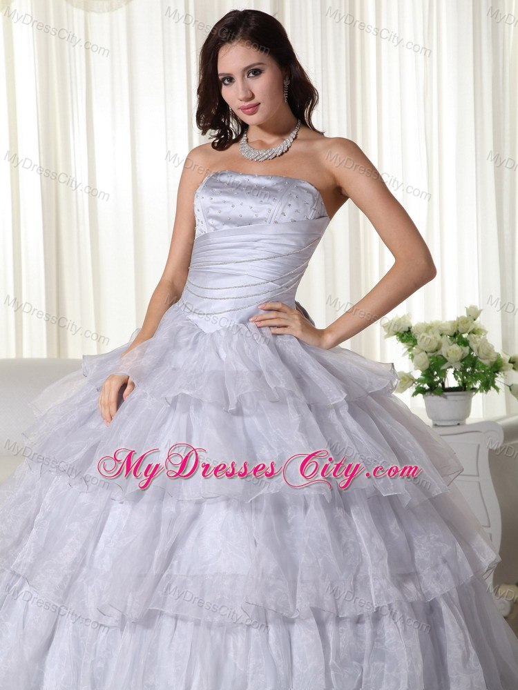 Strapless Organza Ruched Grey Quninceanera Gowns With Ruffled Layers