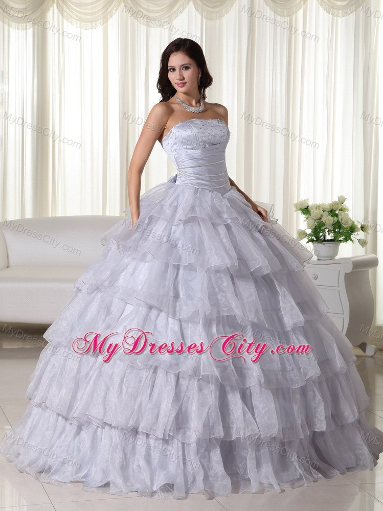 Strapless Organza Ruched Grey Quninceanera Gowns With Ruffled Layers