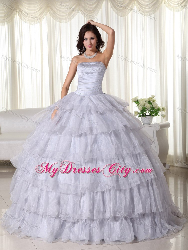 Strapless Organza Ruched Grey Quninceanera Gowns With Ruffled Layers