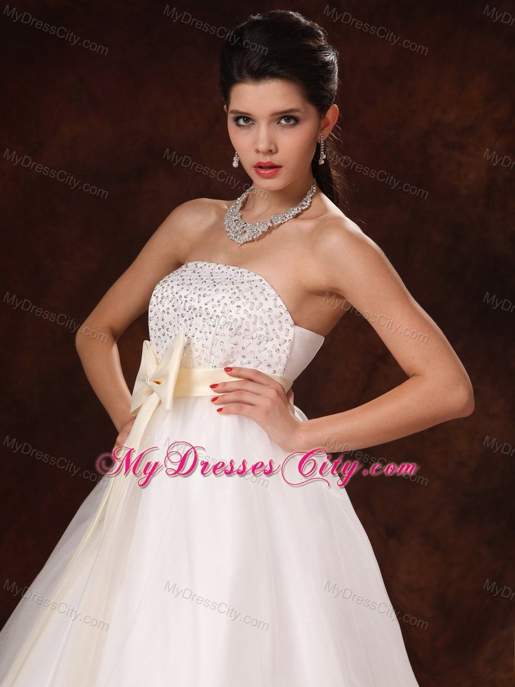 A-Line Beaded Strapless Wedding Dress with Champagne Bowknot