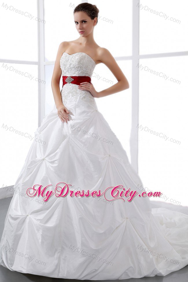 Sweetheart Appliques and Pick-ups Chapel Train Wedding Dress with Red Sash