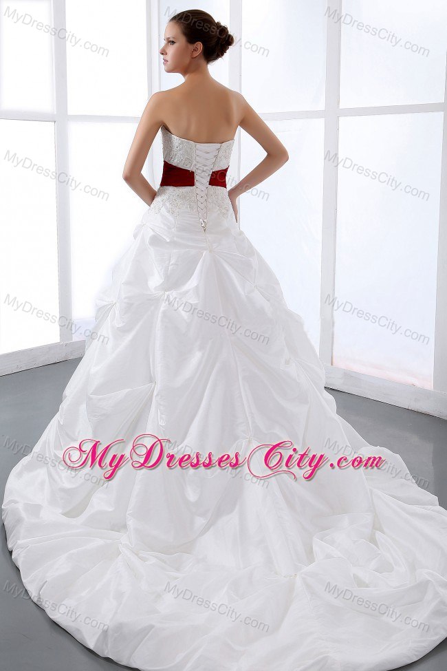 Sweetheart Appliques and Pick-ups Chapel Train Wedding Dress with Red Sash