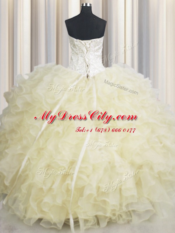 Customized Sleeveless Organza Floor Length Lace Up Quinceanera Gowns in Light Yellow with Beading and Ruffles