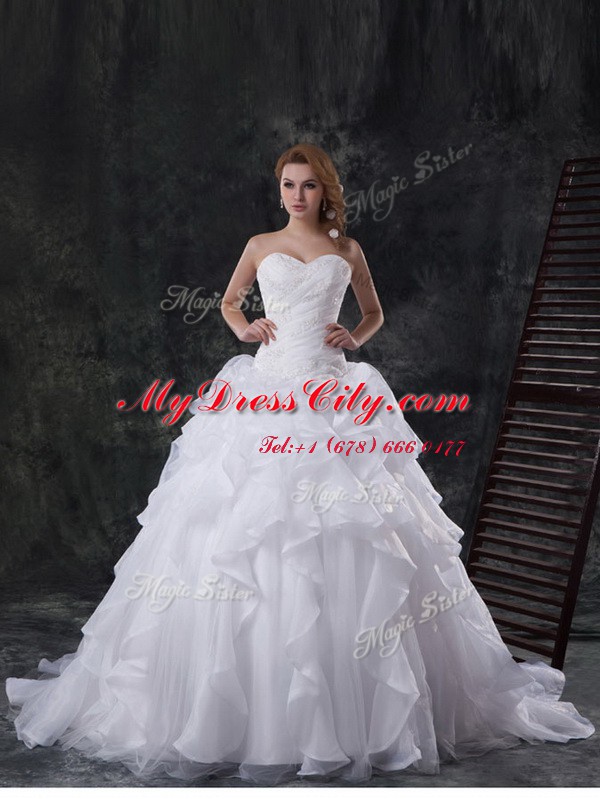 Extravagant Organza Sleeveless With Train Wedding Gowns Brush Train and Beading and Appliques and Ruffles