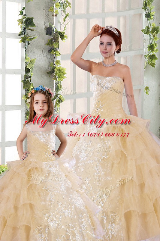 Hot Selling Sleeveless Organza Floor Length Lace Up 15 Quinceanera Dress in Champagne with Beading and Ruffled Layers and Ruching