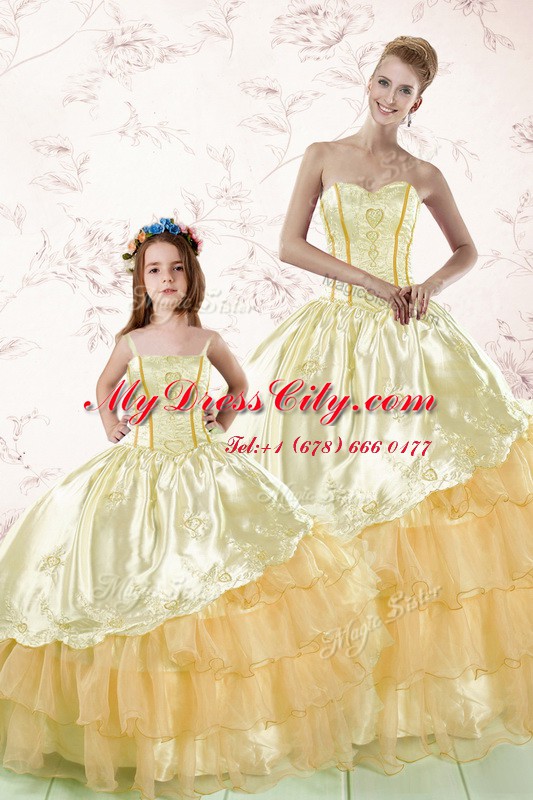 Best Selling Sleeveless Organza Floor Length Lace Up Quinceanera Dresses in Gold with Embroidery and Ruffled Layers